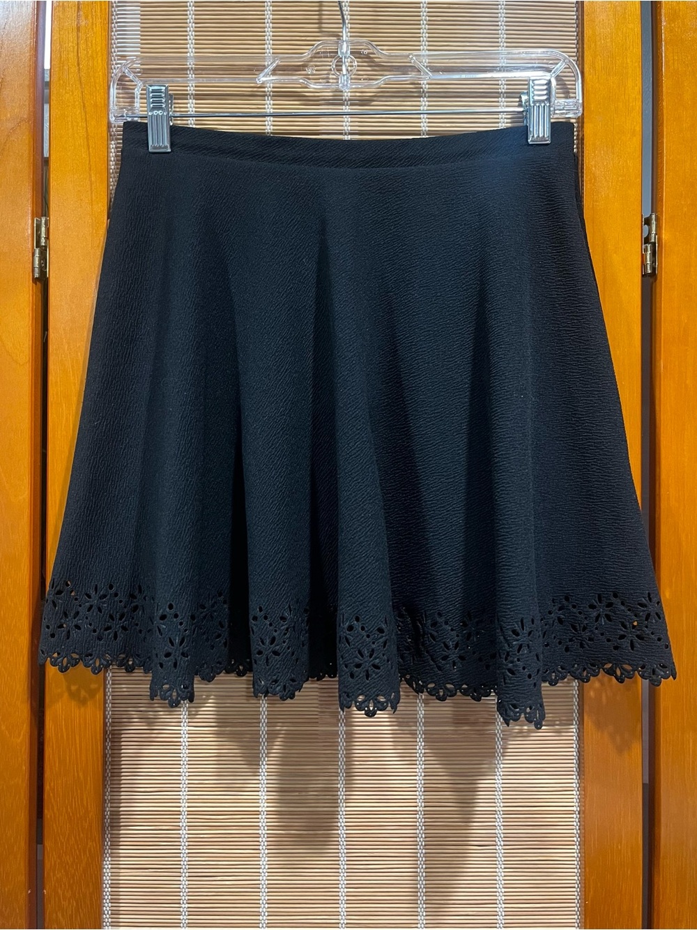 Love Culture black mini circle skirt with laser cut trim, size M